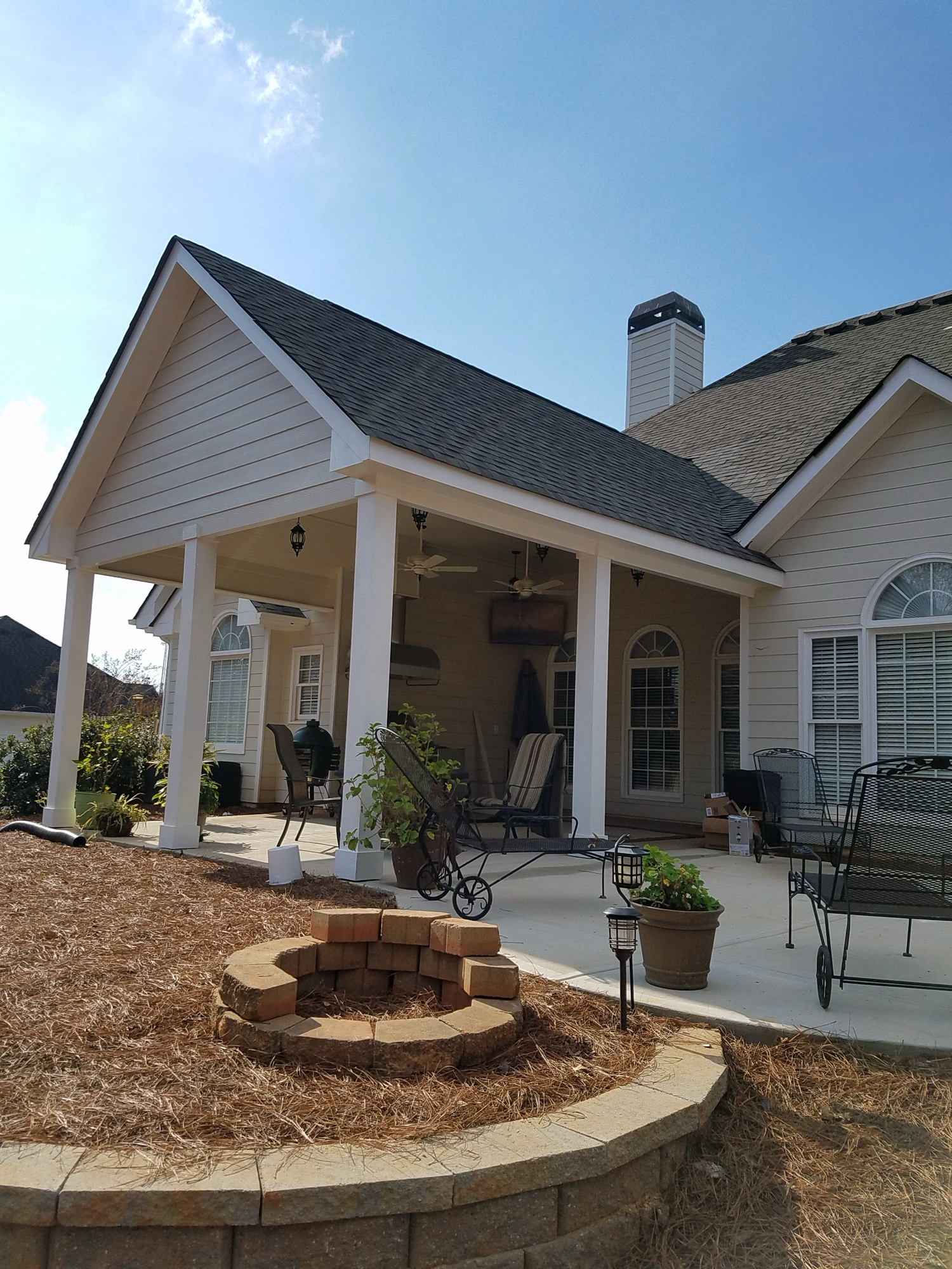 Covered porch addition with fire pit and patio — Keystone South Construction Georgia