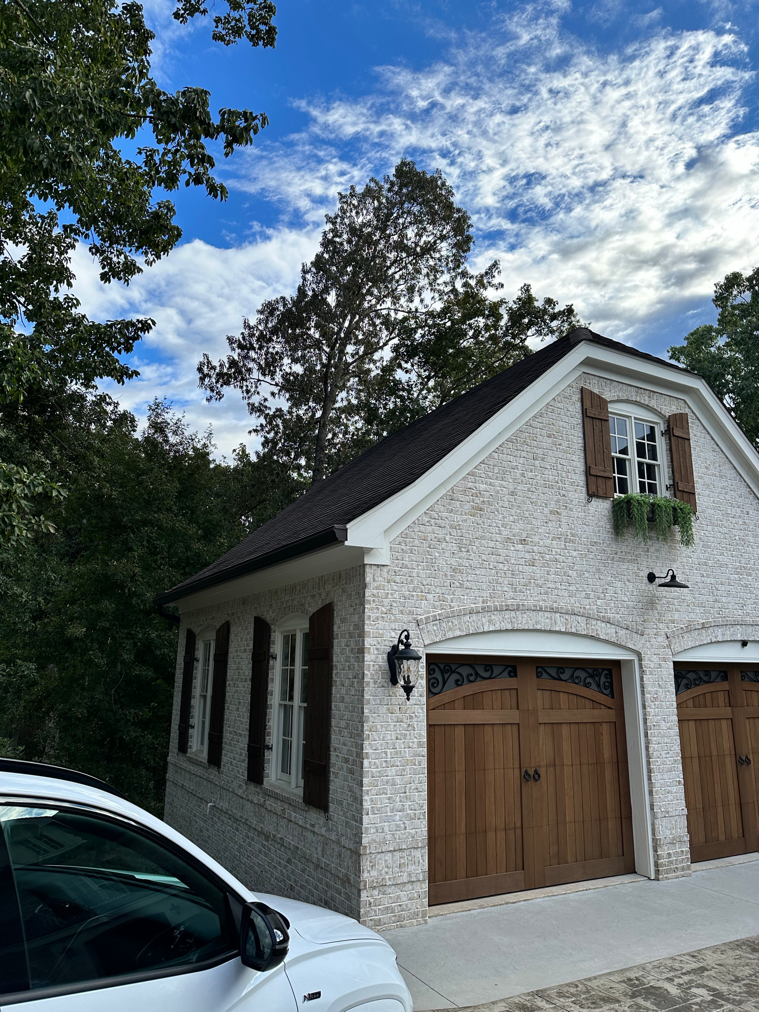 Custom brick carriage house — Lake Lanier home by Keystone South Construction