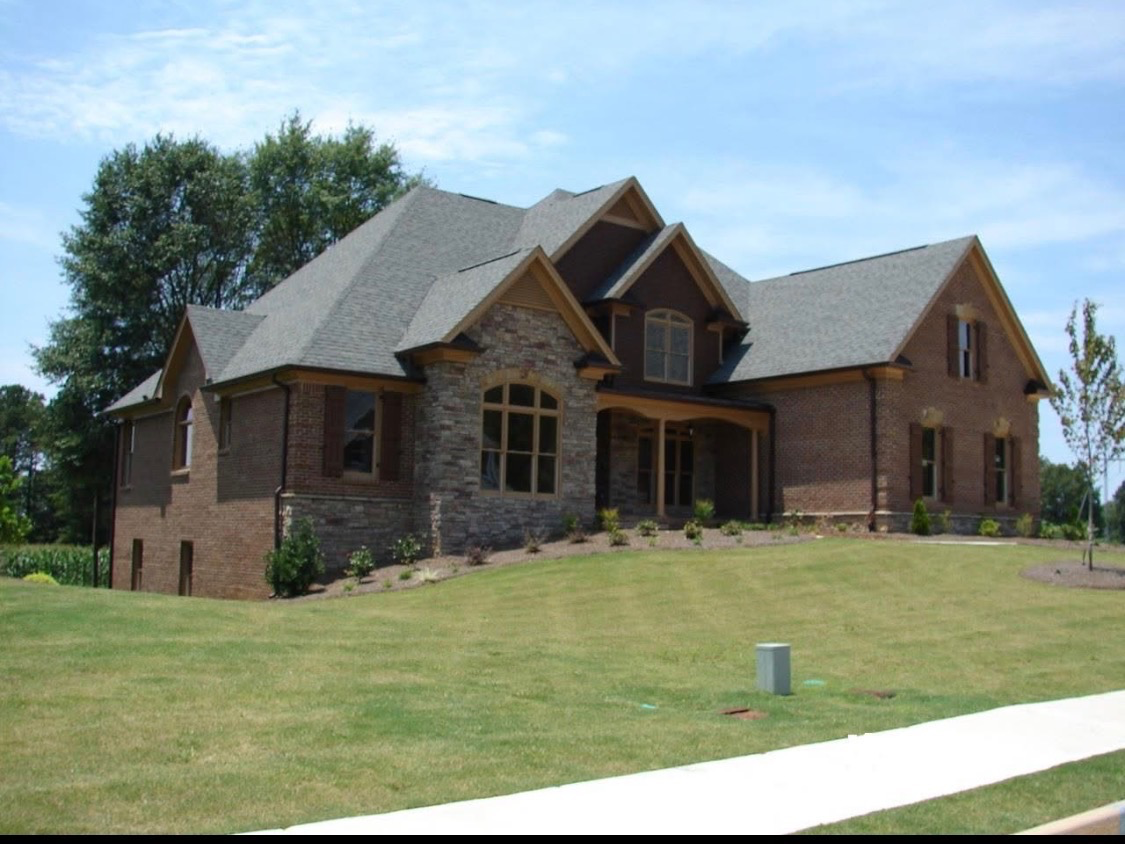 Stone and brick custom home exterior — Keystone South Construction Georgia